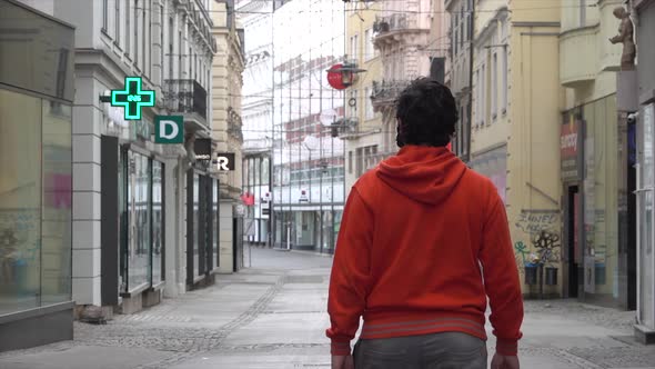 A man passing through the empty city of Brno during the Covid-19 pandemic. Czech republic