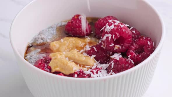 Chia Pudding with Raspberries Peanut Butter and Coconut