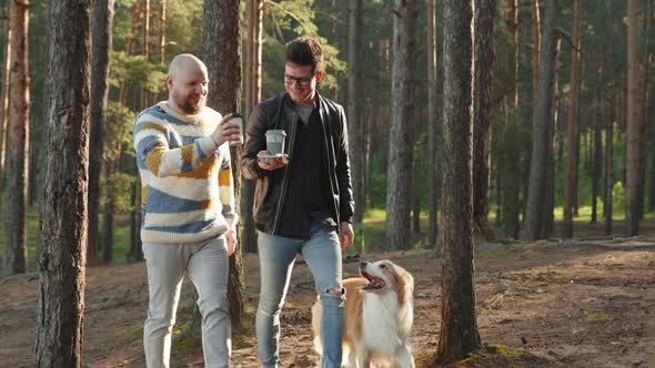 Homosexual Gay Couple Spend Time Together in Park Walk with Dog. Men Dating in Beautiful Forest