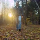 Man Strolls in Forest at Sunset - VideoHive Item for Sale