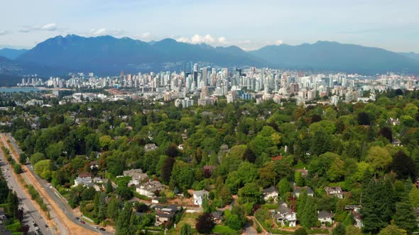 View Of Skyline Buildings From Arbutus Ridge In Vancouver, British Columbia, Canada On A Sunny Day.