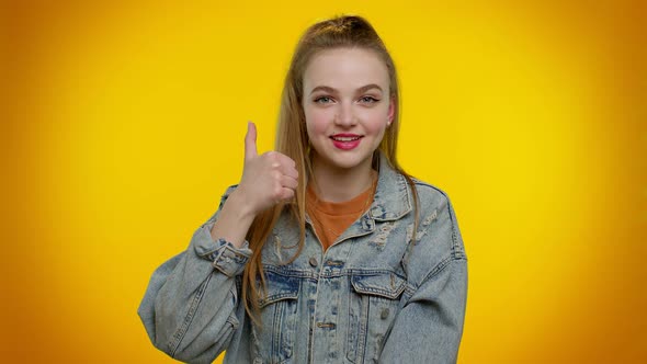 Teenager Girl Raises Thumbs Up Agrees or Gives Positive Reply Recommends Advertisement Likes Good