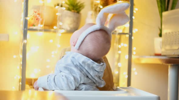 Funny Little Baby Wearing Bunny Ears Easter Concept