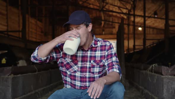 Satisfied Farmer Drinks Morning Milk After Hard Work