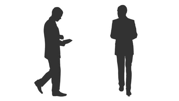 Silhouette of Business Man in Suit Using Ipad While Walking, Alpha Channel