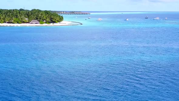 Warm sky of exotic island beach by blue lagoon with sand background before sunset