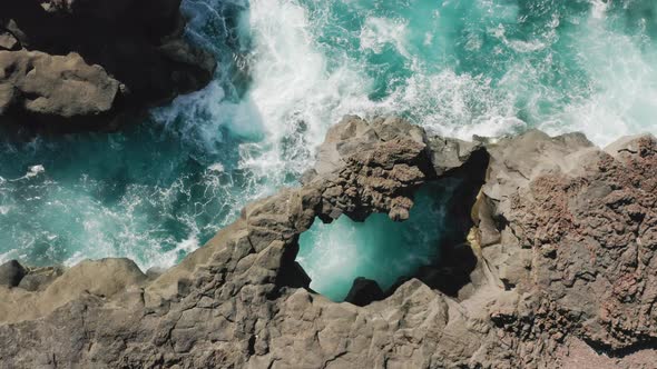 Isolated Island with Rocky Shore Washed with Beautiful Ocean Tides