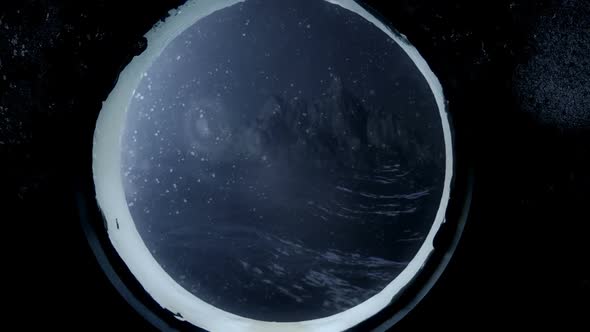 Rocky Island Through A Submarine Window In The Ocean