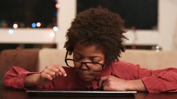 Black Boy Typing on Keyboard.