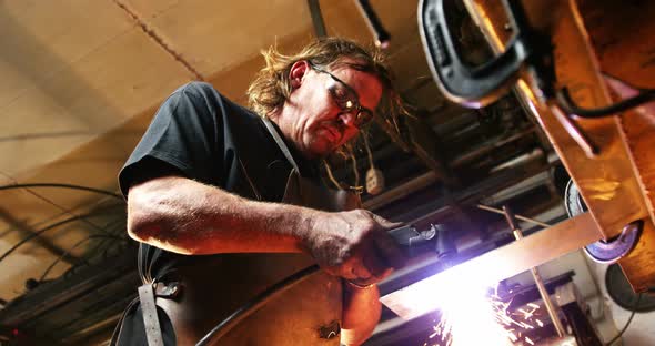 Welder using welding torch