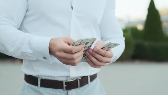 Man Who Counts Money. Hands Of Businessman. Face Is Not Visible.