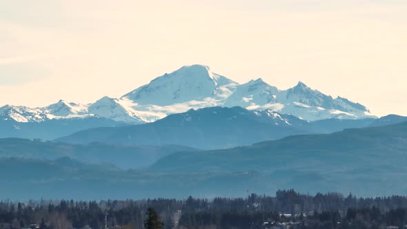 Snow-capped Mount Baker or Koma Kulshan, Washington in USA. Aerial sideways