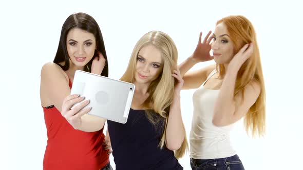 Brunette, Redhead and Blonde Girl Make Selfie Photo on Tablet