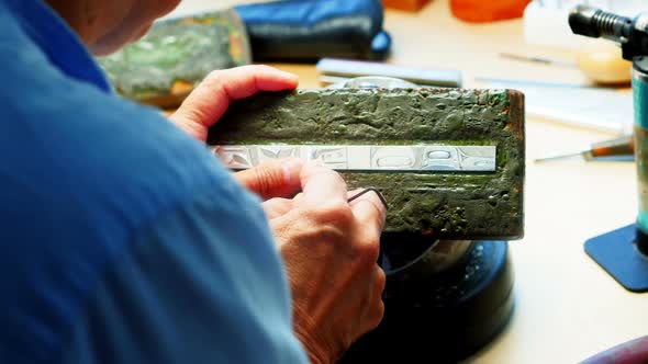 Craftswoman working in workshop