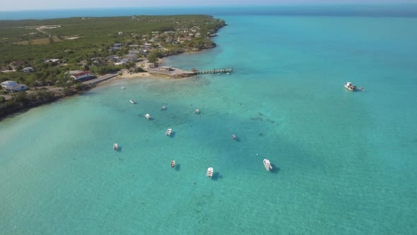 Aerial drone view of a fishing motor boat in the Bahamas, Caribbean. 