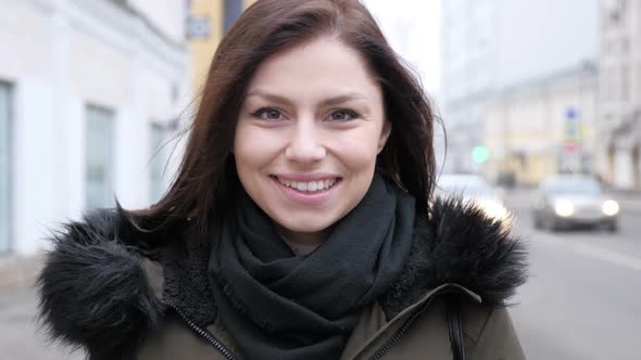 Portrait of Face of Smiling Young Girl Outdoor