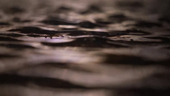 A Water close up in a fountain. Night Shot.