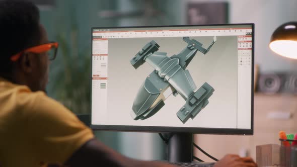 3D Designer Creating Aircraft Model for Videogame
