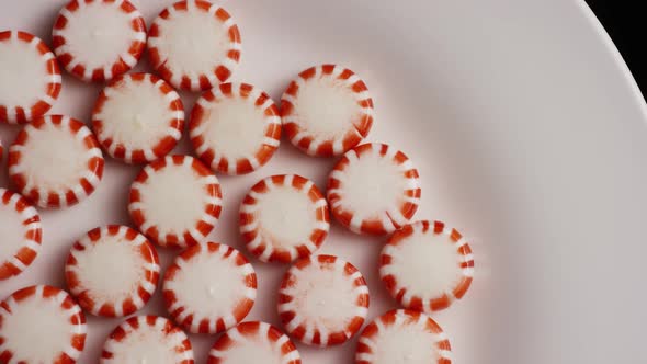 Rotating shot of peppermint candies - CANDY PEPPERMINT 020