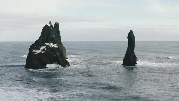 Aerial Footage of Troll Toes on Reynisfjara Black Sand Beach