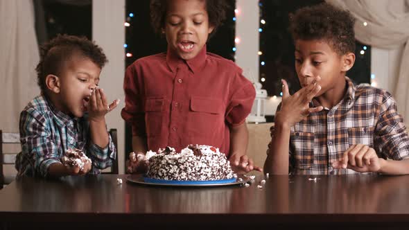 Children Piddle with a Cake.