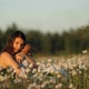 Slow Motion of a Young Happy Mother and Child in a Flower Field at Sunset. - VideoHive Item for Sale