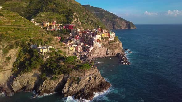 Aerial View of Manarola Village on Cliff Rocks and Turquoise Sea