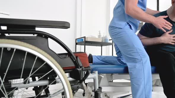 Man with Disability Doing Recovery Exercise with Dumbbell