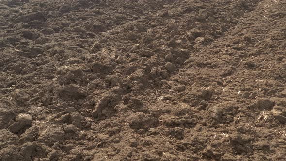 Fertile soil after plowing 4K aerial footage