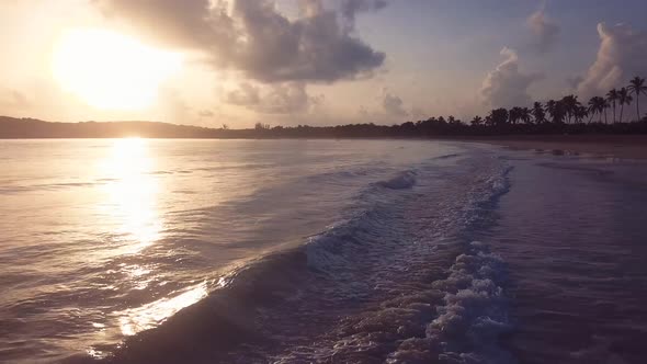 4k 24 Fps Sunrise In The Caribbean Beach In The Mornig With Waves In The Sun