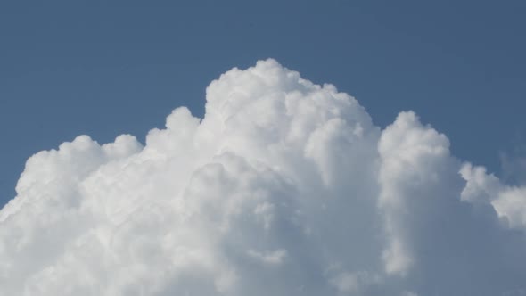 Clouds Avanzing in a Blue Sky