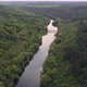 View of the river from above. Flight over water and forest trees from a height - VideoHive Item for Sale