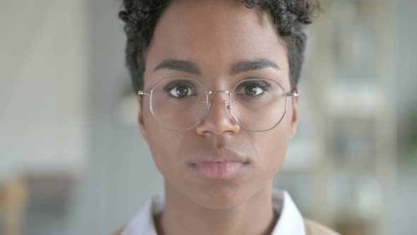 Portrait of Beautiful African Girl Wearing Glasses