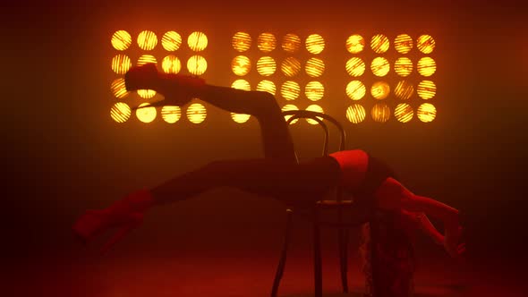 Tempting Girl Dancer Performing Sexy Dance on Chair