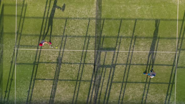 View From the Height of the Tennis Court Where People Play in the Tennis