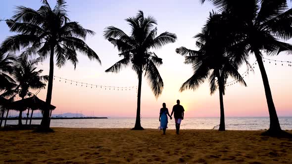 NaJomtien Pattaya Thailand Hammock on the Beach During Sunset with Palm Trees