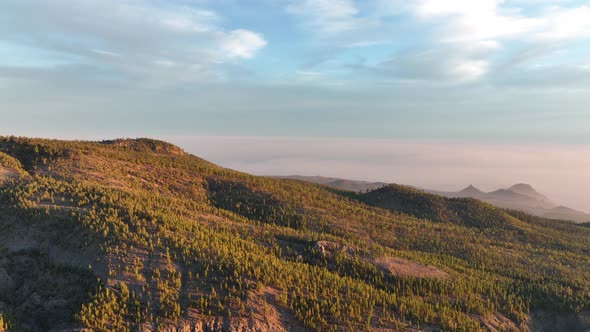 Aerial of a Mountain Range at Sunset in Tenerife Spain Nature Island Trees Hills Rocks Cliffs and