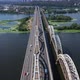 Traffic on the Darnytsky Bridge Over the River Dnipro in Kyiv - Aerial Shot - VideoHive Item for Sale