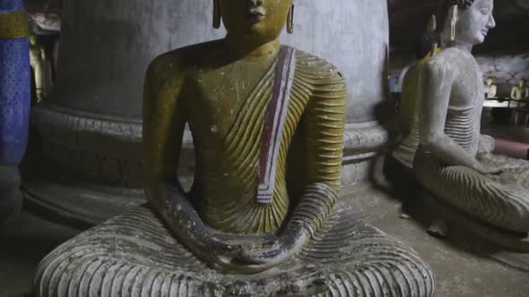 DAMBULLA, SRI LANKA - FEBRUARY 2014: Sitting Buddhas at the Golden Temple of Dambulla. The Golden Te