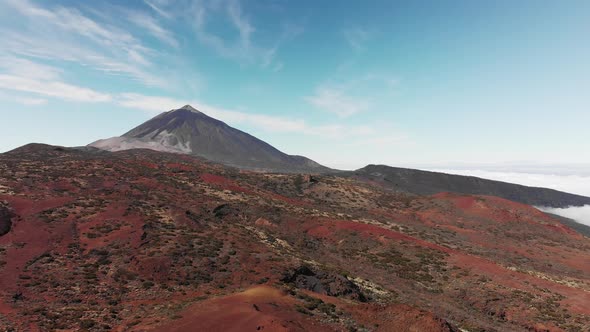 Aerial Shot. Peak of the Mountain Volcano. Red Volcanic Landscape. Canary Islands, Teide Volcano