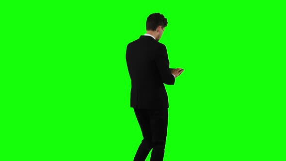 Man Is Going To Work and Prints Important Messages. Green Screen