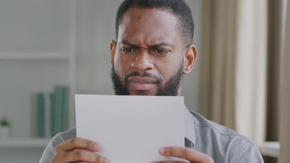 Unhappy Young African Guy Received Bad News Irritated By Mistake Feeling Stressed About Dismissal