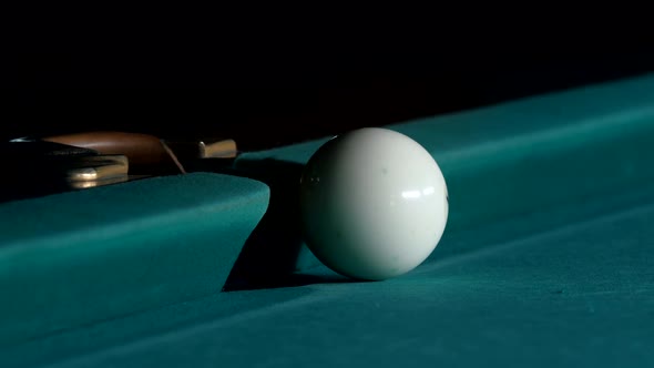 White Ball Falls Into a Pocket Billiard After Impact