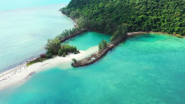 Ko Tae Nai, Koh Phangan, Thailand. Small tropical cay with natural pool and sandbank covered with tr