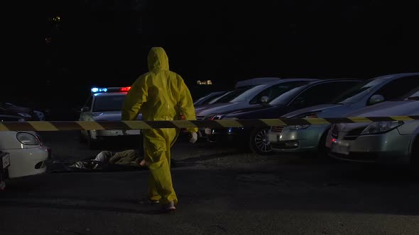 Toxic Poisoning Crime, Forensics Expert in Protective Suit Walking to Victim