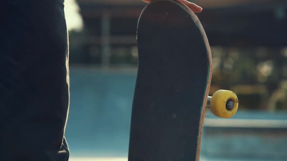 Young Skater Spinning Skateboard