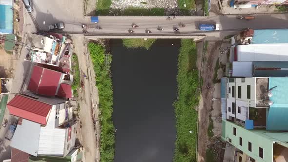 Aerial view above of an extremely polluted river, Cambodia.