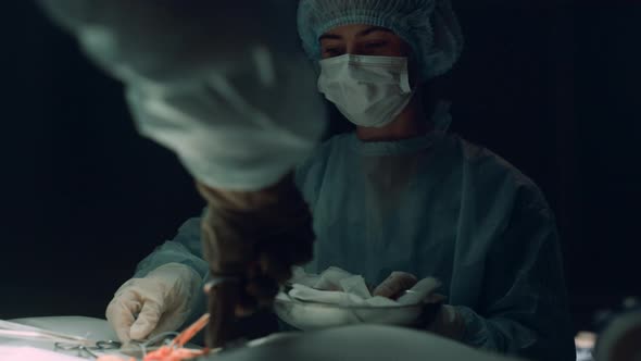 Nurse Assisting Operation Practitioner in Clinic Room