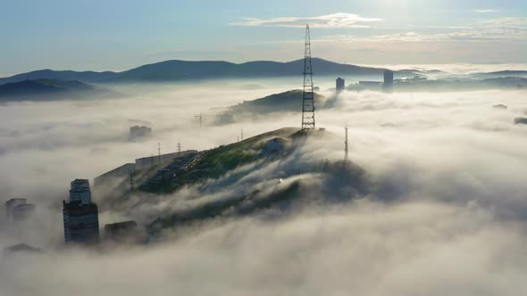 Drone View of the Vladivostok Lowlands Covered in Morning Sea Mist at Dawn
