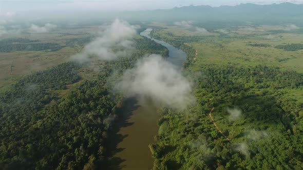 Flyover Cloud Covered Jungle River